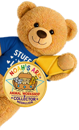 Adventure bear wearing a blue shirt with its gold Collector Medallion