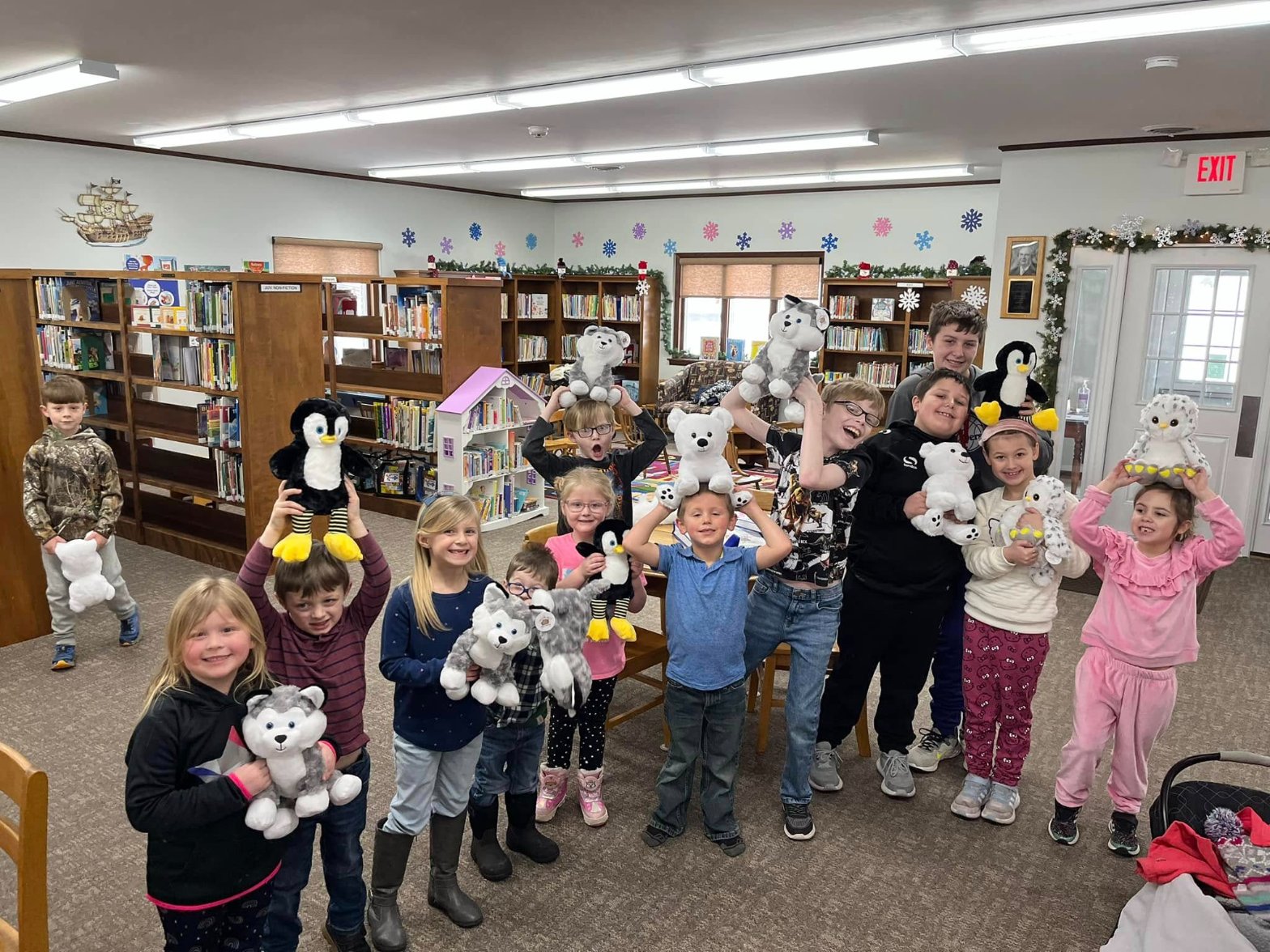 Children building their Furry Friends at a library workshop event