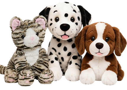 A striped plush cat, a spotted Dalmatian, and a brown-and-white dog from Noah's Ark Animal Workshop.