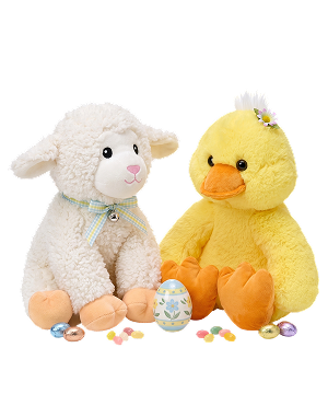 A lamb and yellow duck plush with pastel Easter eggs from Noah's Ark Animal Workshop.