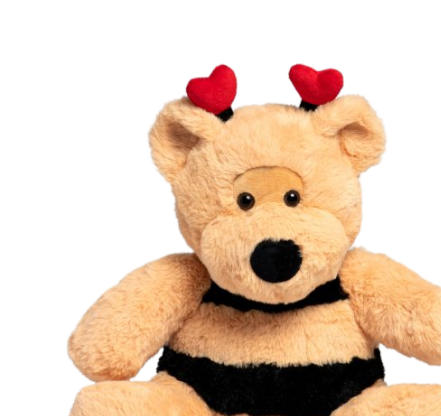 Plush bear holding a heart