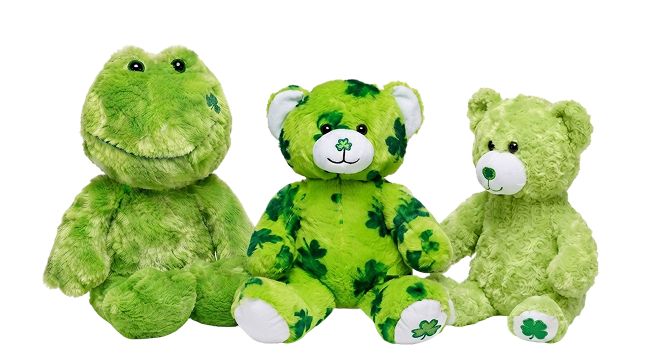 Three green plush toys, including a frog and two teddy bears with clover details, from Noah's Ark Animal Workshop.